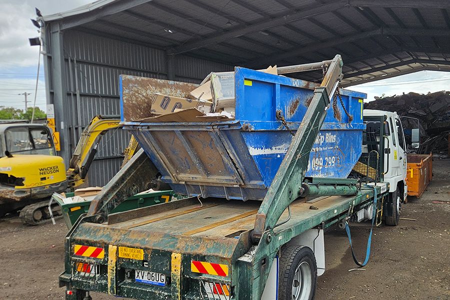 Apex Bins marrel truck placing skip bin — Point Cook and City of Wyndham