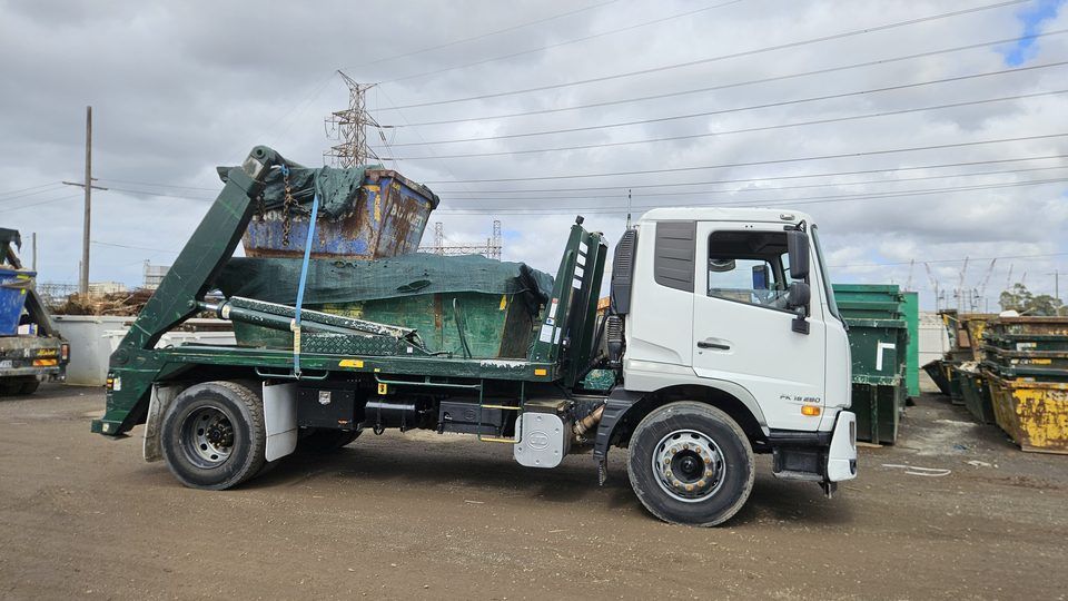 Apex Bins marrel skip bin delivery truck